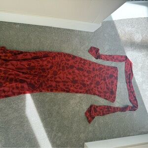 Long red floral dress with neck scarf perfect for weddings and prom